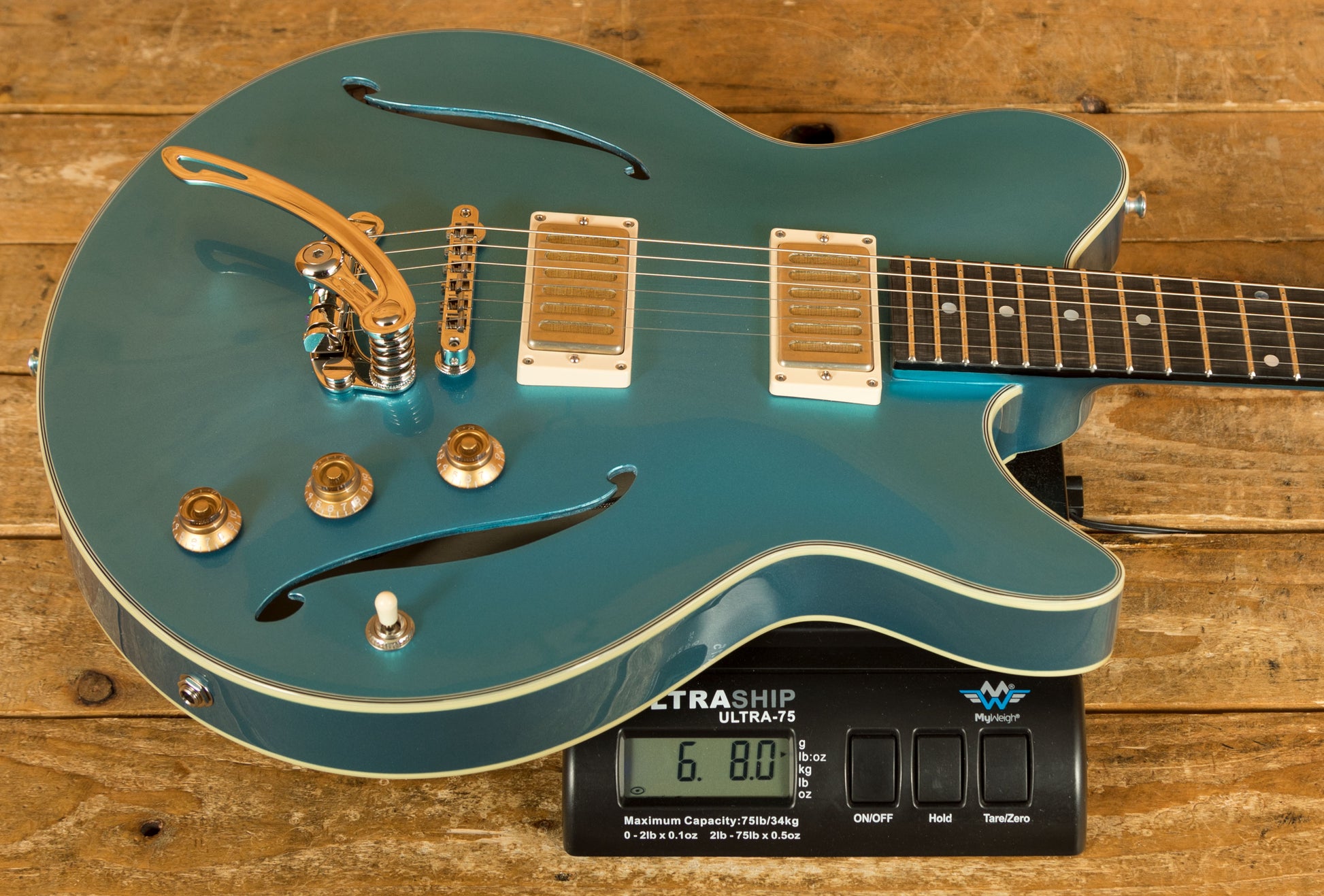 Đàn Guitar Điện Eastman Truetone Gloss Romeo LA | Celestine Blue