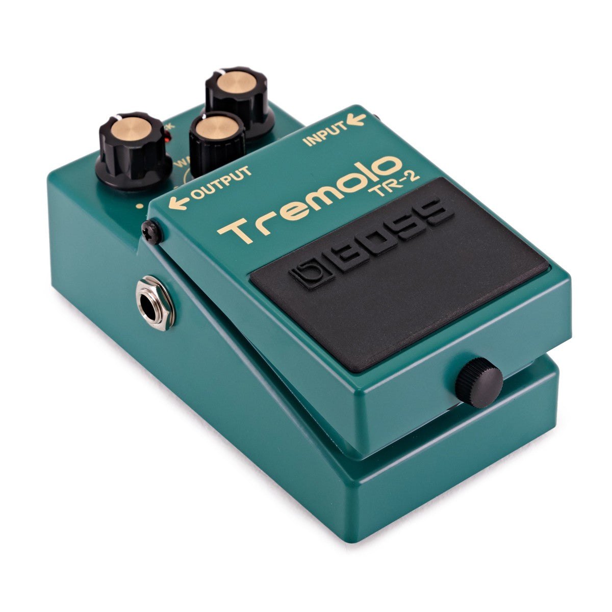 Phơ Tremolo BOSS TR-2 – nhìn nghiêng bên trái, thấy cổng OUTPUT và vỏ màu xanh ngọc